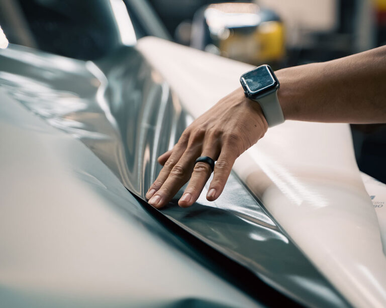 Closeup of Technician applying PPF